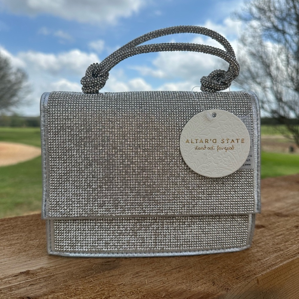 NWT Urban Expressions Silver Clutch/Purse with handle and matching chain straps.